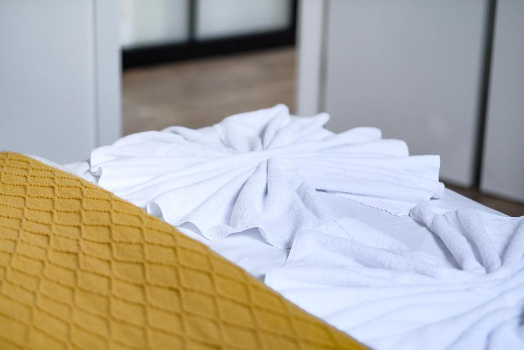 Posteľ alebo postele v izbe v ubytovaní Apartament Spacerowa Lux