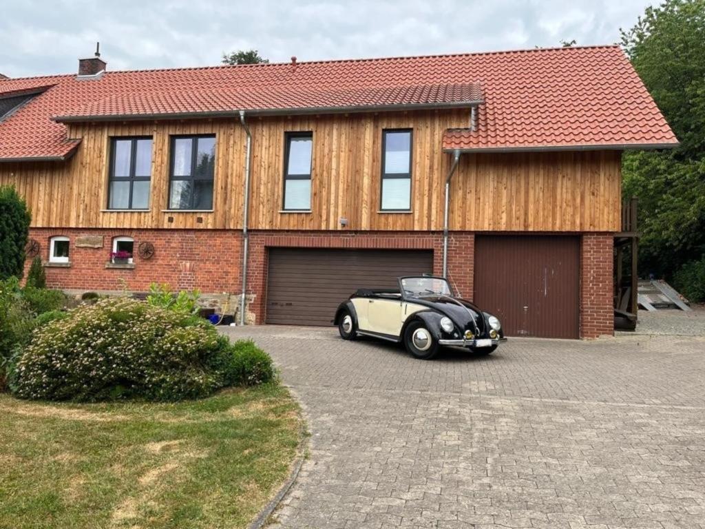a car parked in front of a house at Alte Försterei Goldbeck in Rinteln