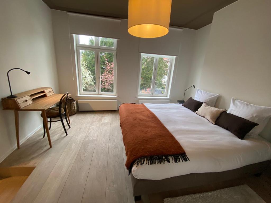 Postel nebo postele na pokoji v ubytování B&B Residence9Bruges
