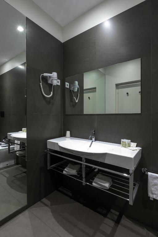Koupelna v ubytování Tempus Hotel & Spa