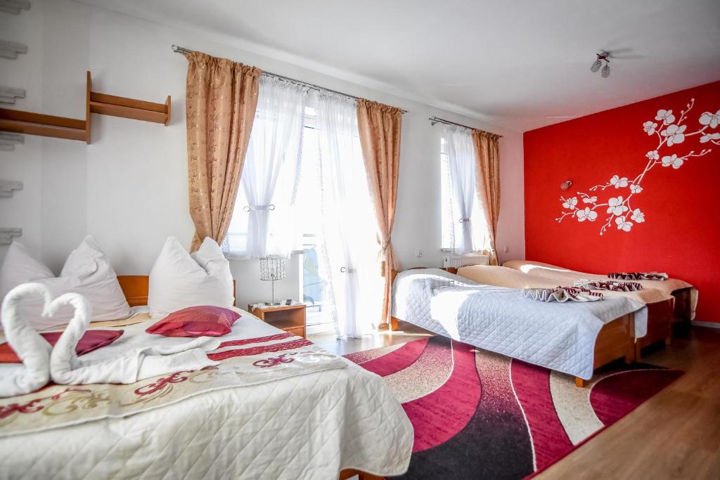 Postel nebo postele na pokoji v ubytování Kukucówka Zakopane