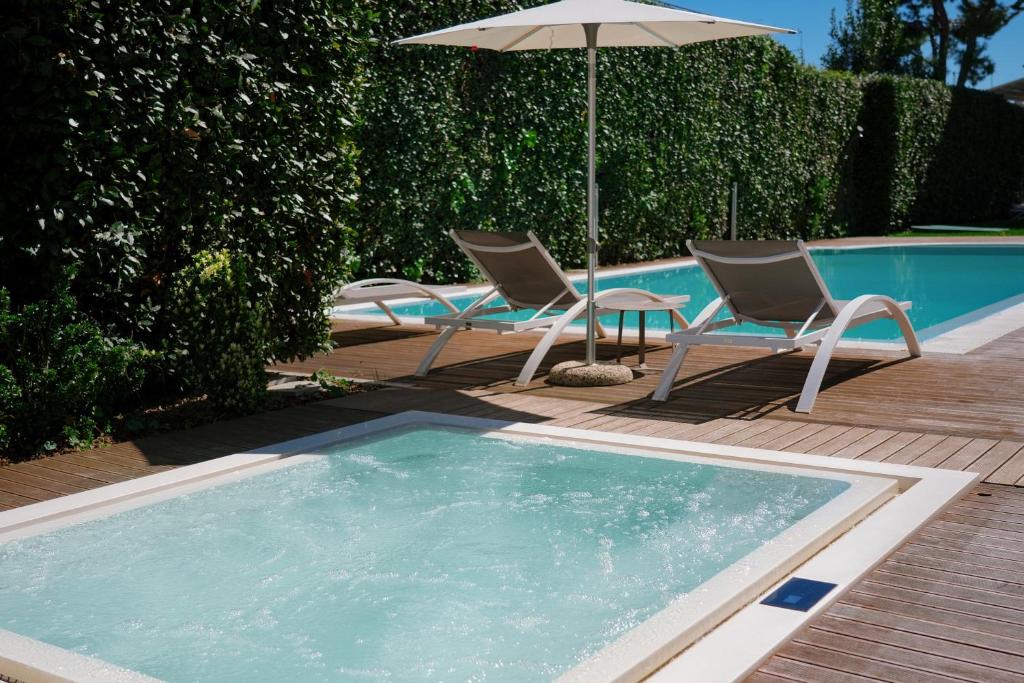 Bazén v ubytovaní Hotel Palazzo del Garda & Spa alebo v jeho blízkosti