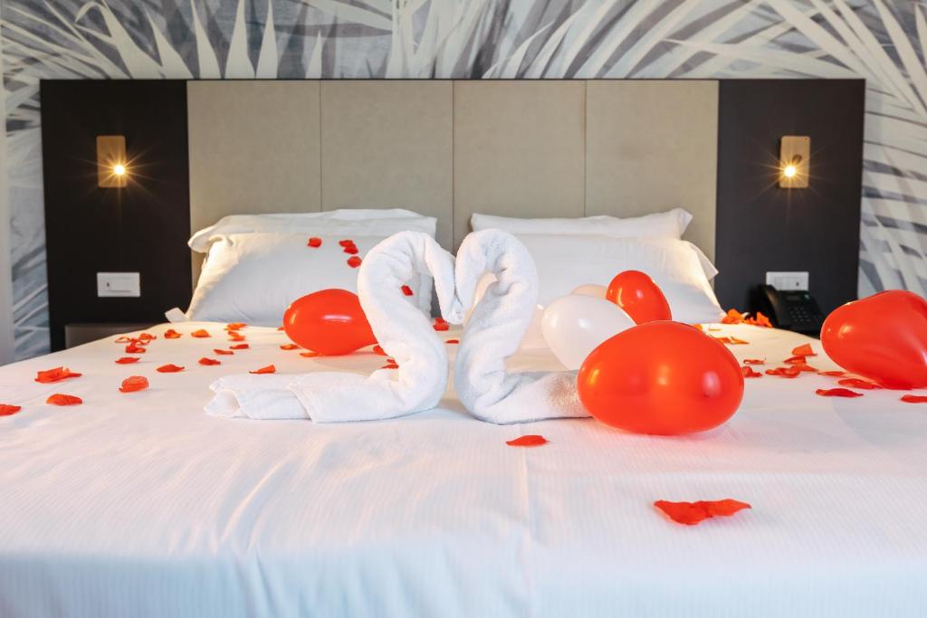 Postel nebo postele na pokoji v ubytování Hotel Arilica