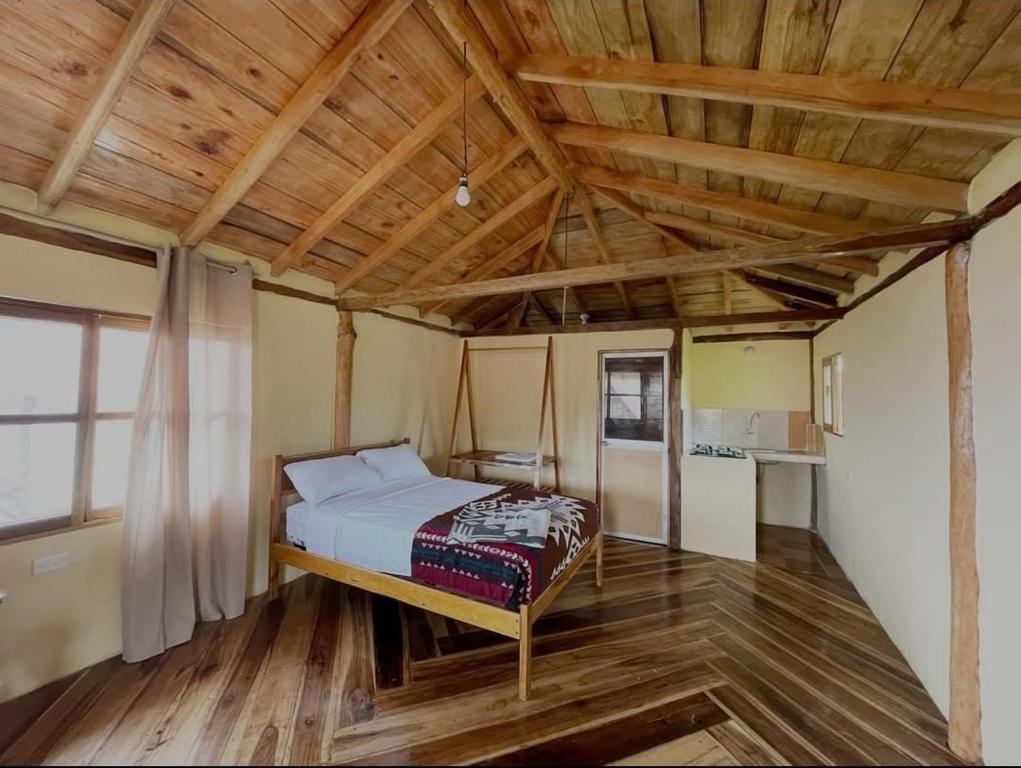 Postel nebo postele na pokoji v ubytování Hotel Palma Coco