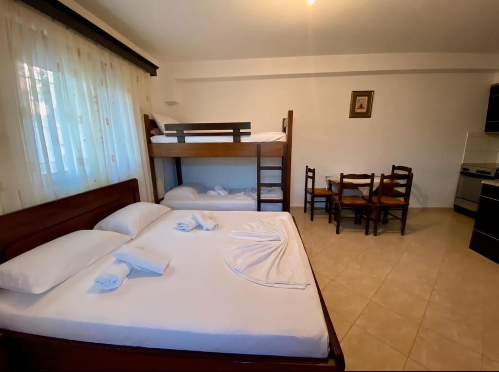 Postel nebo postele na pokoji v ubytování Melita Apartments
