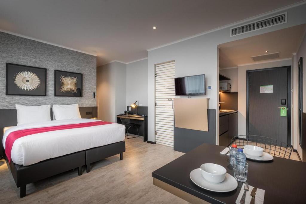 Postel nebo postele na pokoji v ubytování Hotel Jamingo