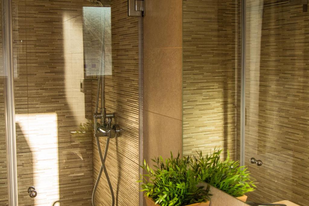 Koupelna v ubytování Hotel Novomar