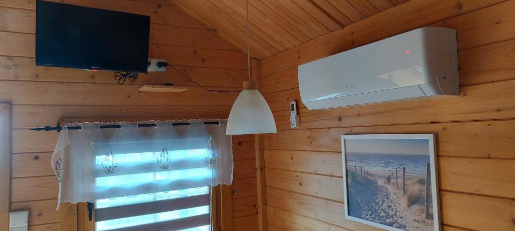 TV a/nebo společenská místnost v ubytování Arcada