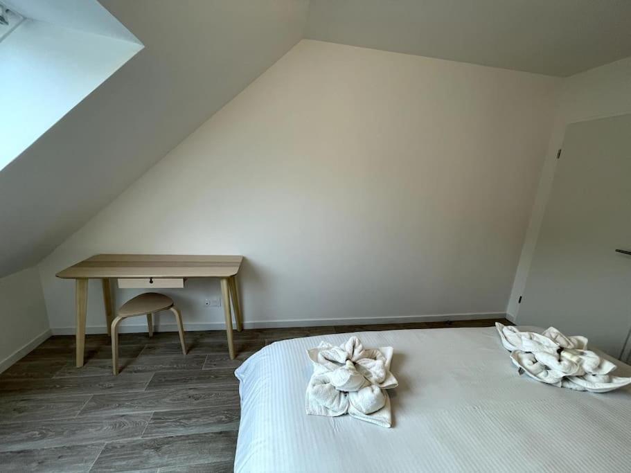 Postel nebo postele na pokoji v ubytování Freesia, Maison neuve avec jardin et garage