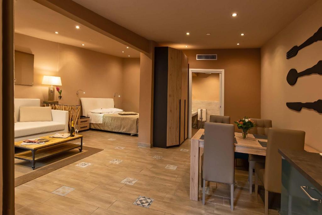 Postel nebo postele na pokoji v ubytování Hotel Orcagna