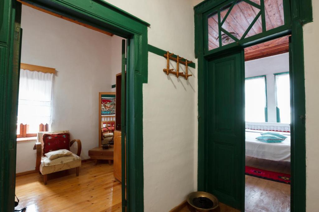 Postel nebo postele na pokoji v ubytování GuestHouse 1805