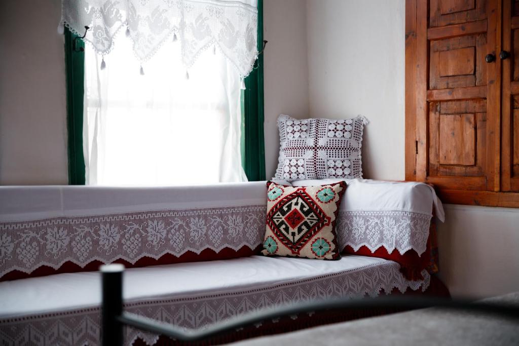 Postel nebo postele na pokoji v ubytování GuestHouse 1805