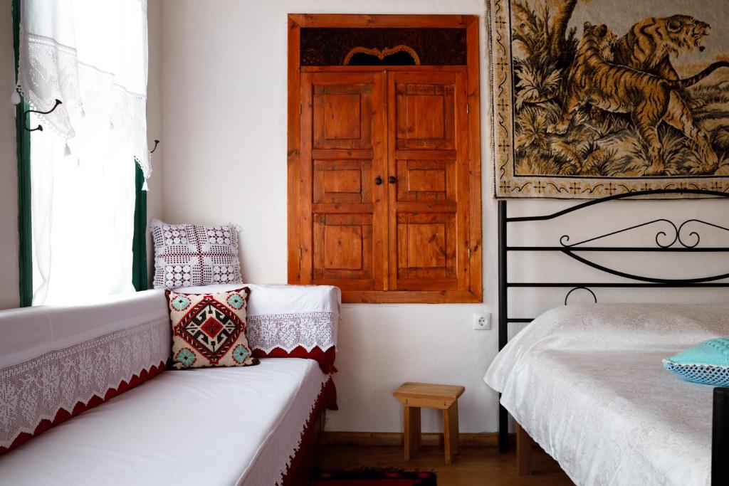 Postel nebo postele na pokoji v ubytování GuestHouse 1805