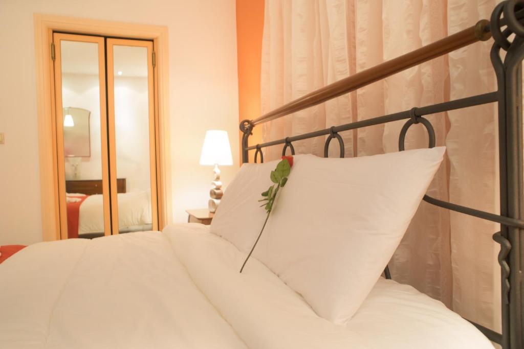 Postel nebo postele na pokoji v ubytování Mythos- Platanias- Hotel -Apts