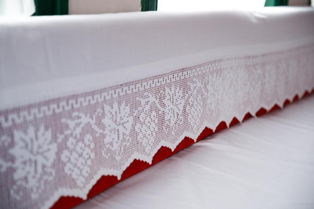 Postel nebo postele na pokoji v ubytování GuestHouse 1805
