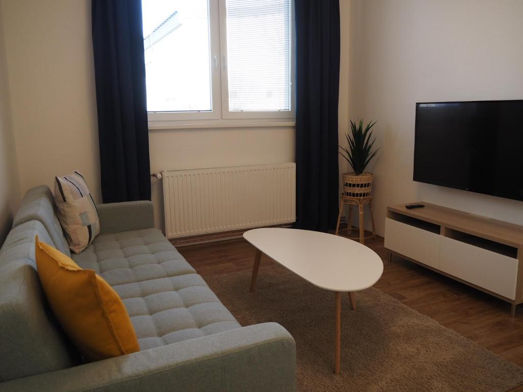 TV a/nebo společenská místnost v ubytování Apartmány Abacie