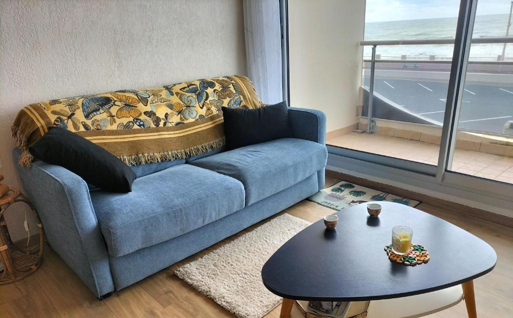 Posezení v ubytování Appartement face mer