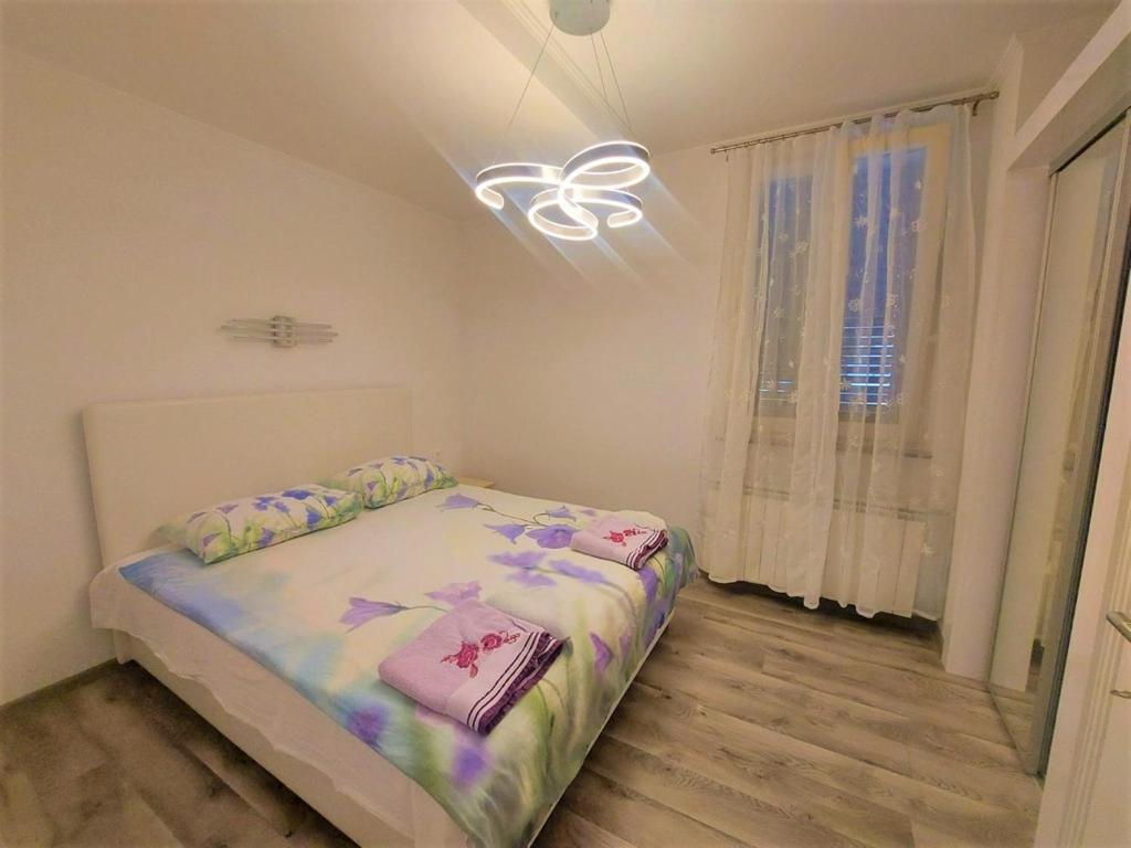 Posteľ alebo postele v izbe v ubytovaní Beach Villa Baška