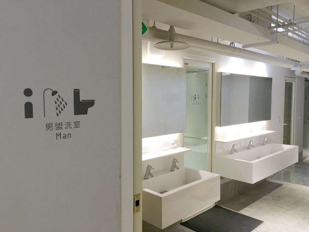 Koupelna v ubytování 日初青旅 Sundaily Hostel 北車