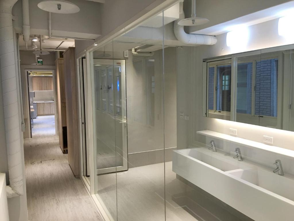 Koupelna v ubytování 日初青旅 Sundaily Hostel 北車
