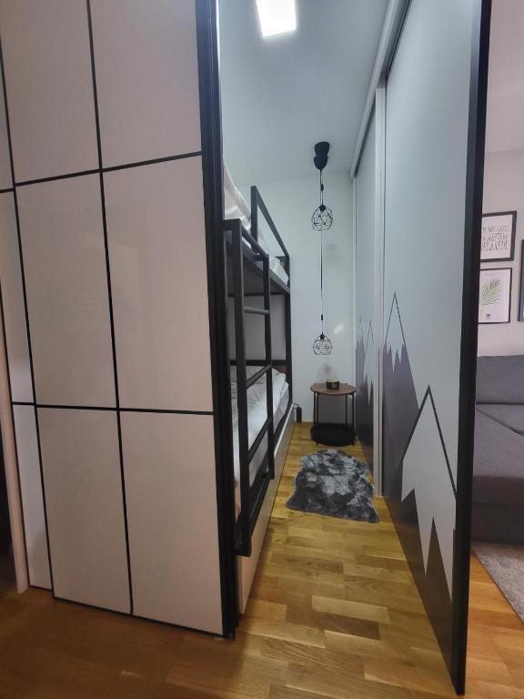 Postel nebo postele na pokoji v ubytování Serendipity Apartment