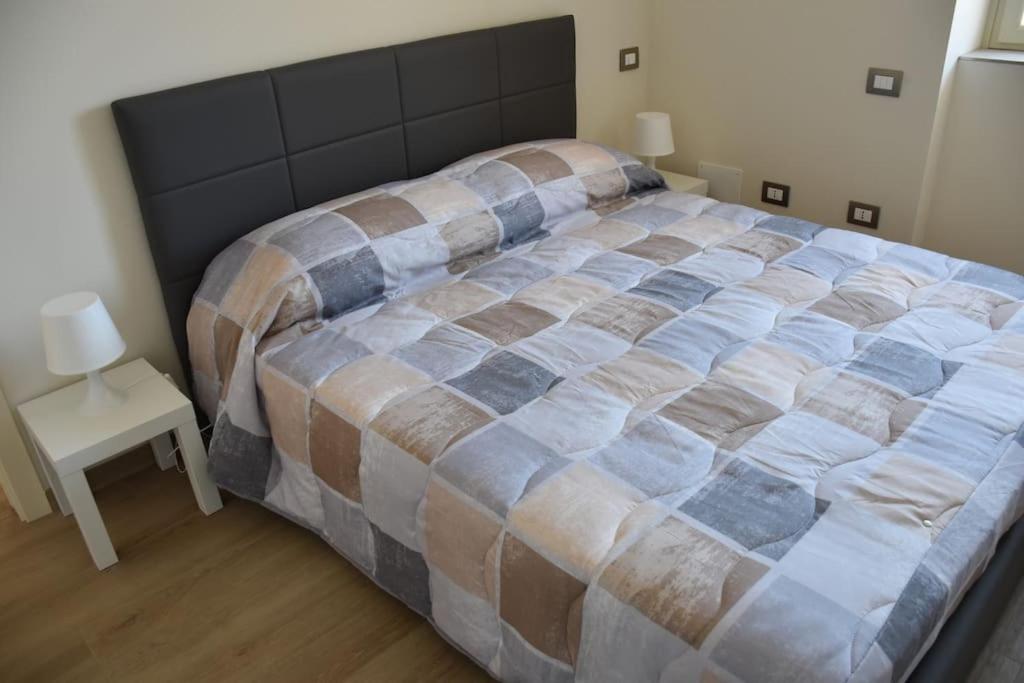 Ліжко або ліжка в номері Casa vacanze Casa Vittoria cod.017106-cni-00074