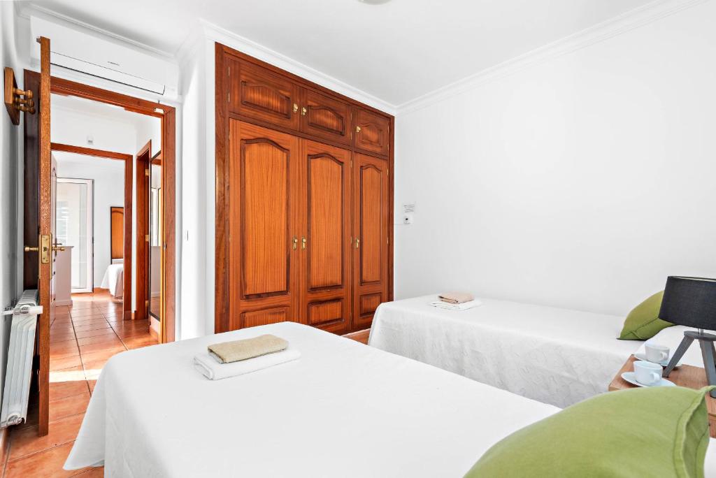 Postel nebo postele na pokoji v ubytování Villa Sol Menorca
