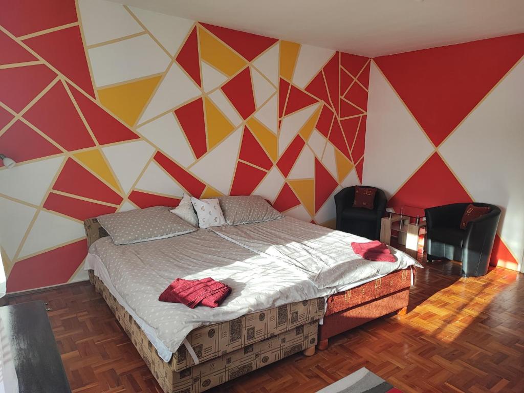 Postel nebo postele na pokoji v ubytování Szaffi apartman