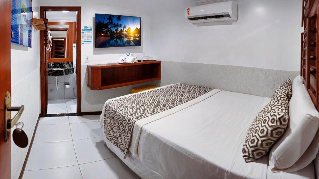 Postel nebo postele na pokoji v ubytování Mini Hotel Dunas