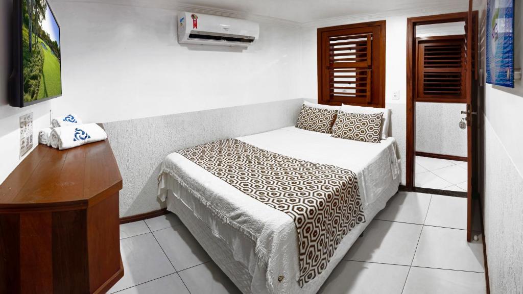 Postel nebo postele na pokoji v ubytování Mini Hotel Dunas