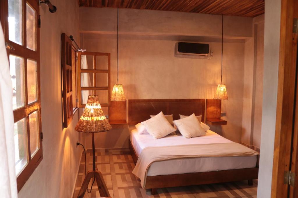 Postel nebo postele na pokoji v ubytování Hotel Gavia - Rio y Mar