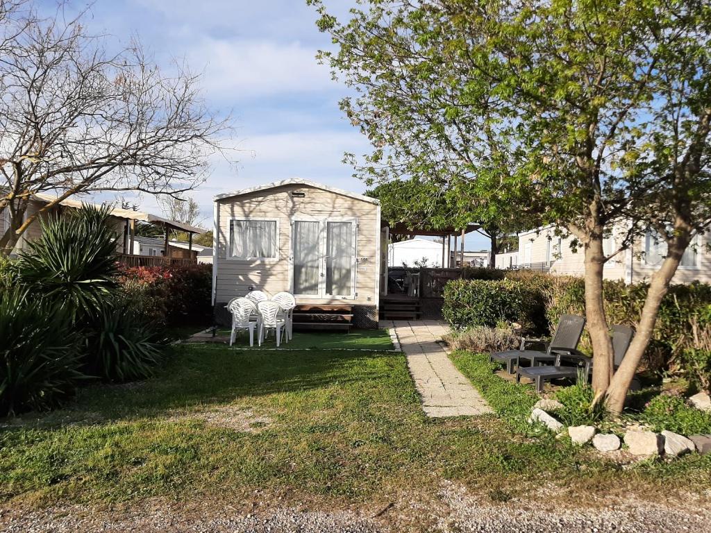 Zahrada ubytování SERENITY 565 au Lac Des Rêves-camping 4 étoiles-mobil home 3ch-6pl-clim-sdb- wc séparé-au calme, belle vue sur le lac, sans vis à vis