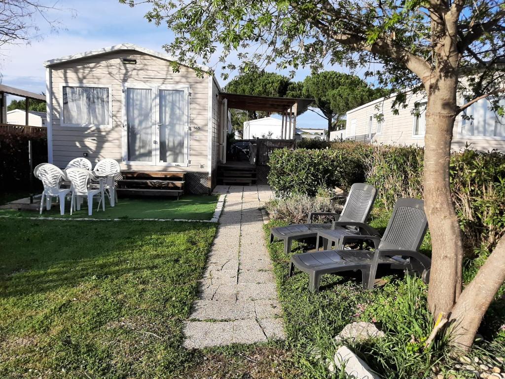 Zahrada ubytování SERENITY 565 au Lac Des Rêves-camping 4 étoiles-mobil home 3ch-6pl-clim-sdb- wc séparé-au calme, belle vue sur le lac, sans vis à vis