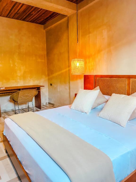 Postel nebo postele na pokoji v ubytování Hotel Gavia - Rio y Mar