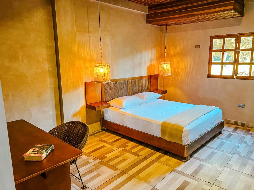 Postel nebo postele na pokoji v ubytování Hotel Gavia - Rio y Mar