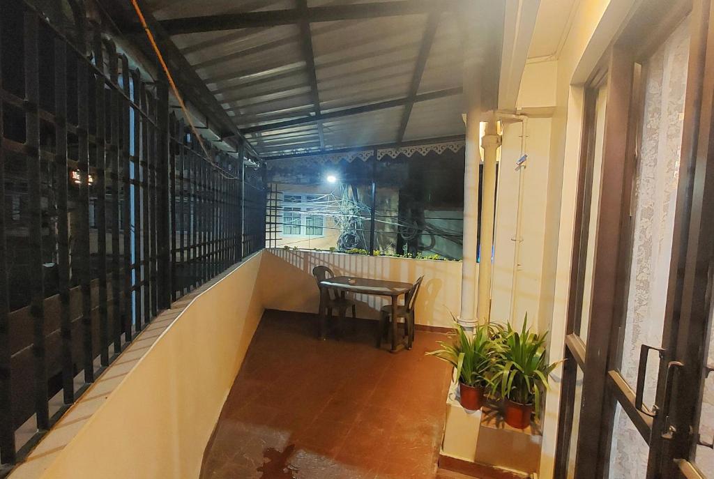 Balkón nebo terasa v ubytování Indivar Homestay