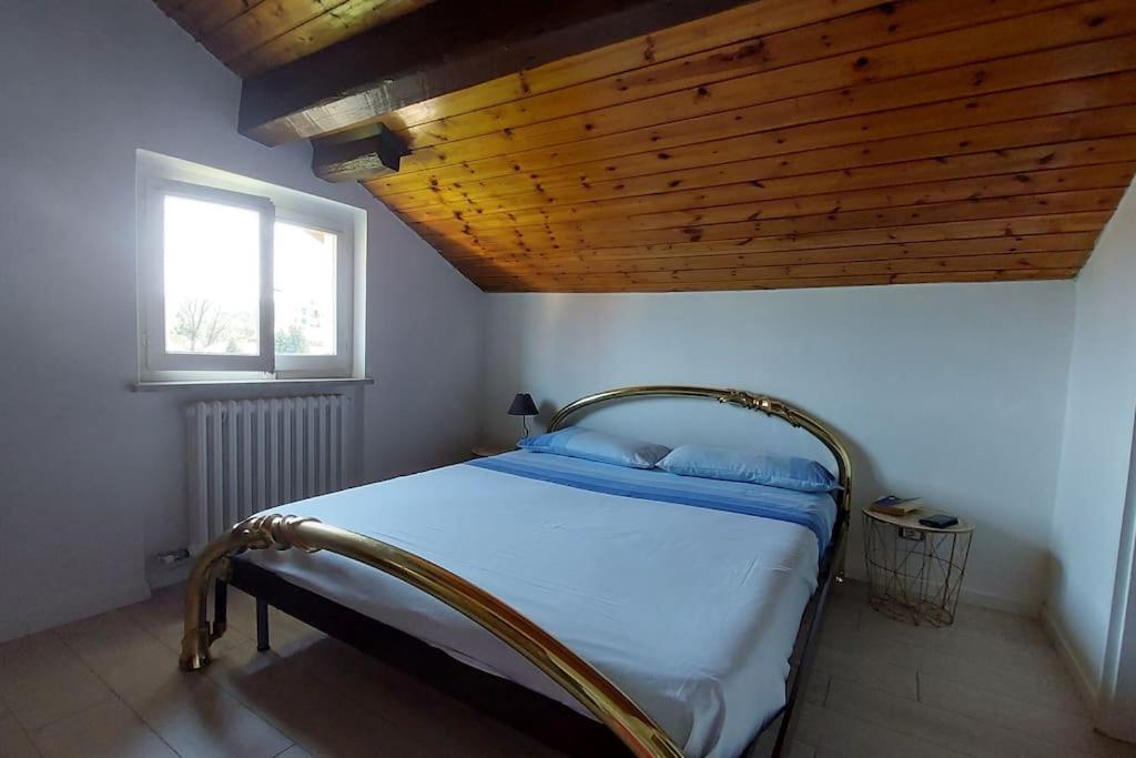 Postel nebo postele na pokoji v ubytování Comodo, pratico e tranquillo