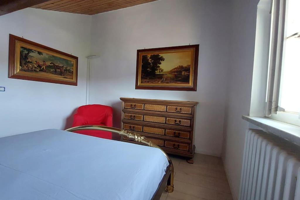 Postel nebo postele na pokoji v ubytování Comodo, pratico e tranquillo