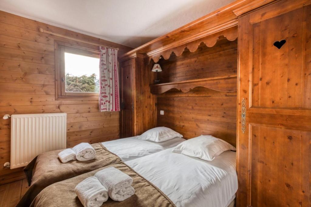 Posteľ alebo postele v izbe v ubytovaní Résidence Les Alpages de Chantel - maeva Home - Appartement 4 Pièces 8 Personnes - Sélection MAE-1649