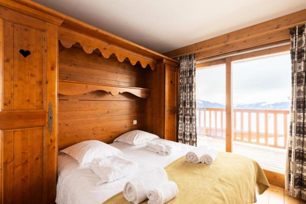 Posteľ alebo postele v izbe v ubytovaní Résidence Les Alpages de Chantel - maeva Home - Appartement 3 Pièces 6 Personnes - Sélection MAE-1652