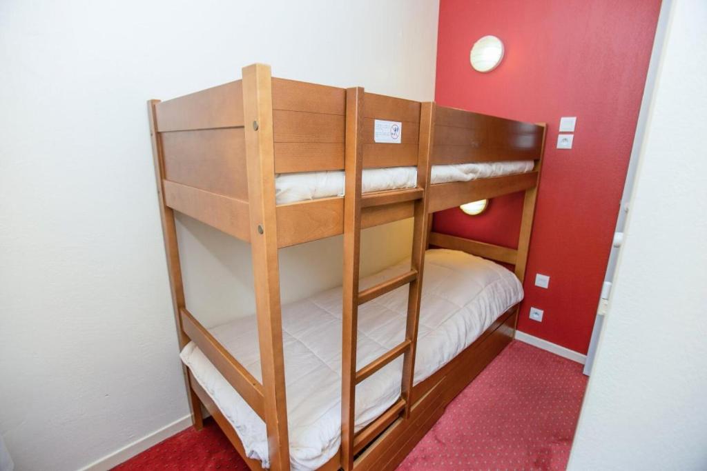 Posteľ alebo postele v izbe v ubytovaní Résidence Les Rives de L'Aure - maeva Home - 2 Pièces 6 Personnes Sélection MAE-4301