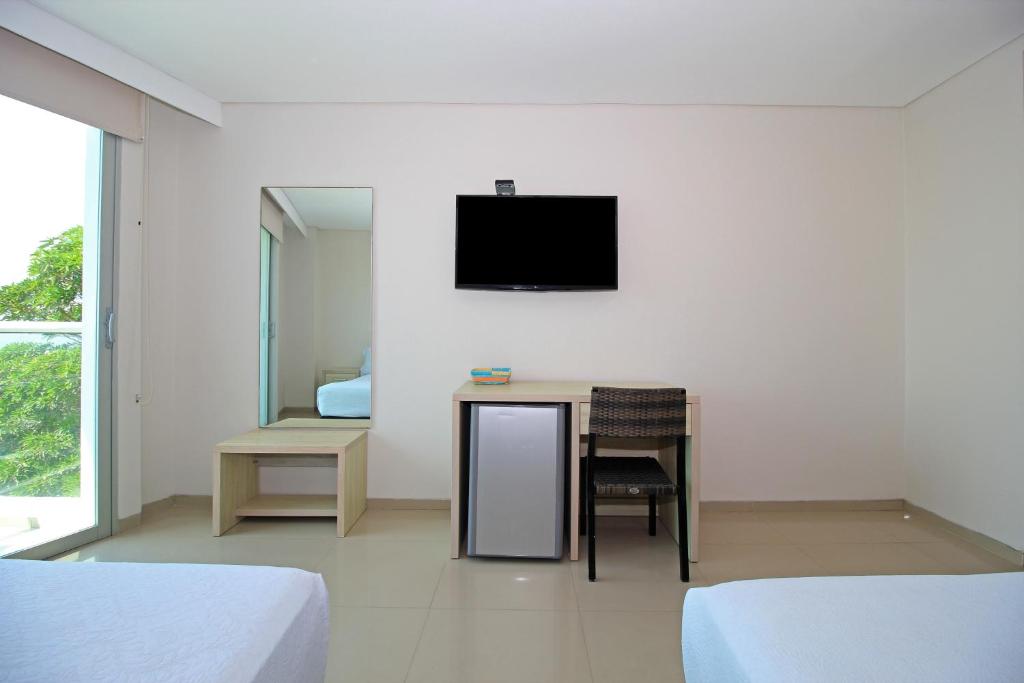 TV a/nebo společenská místnost v ubytování Hotel Summer Frente Al Mar