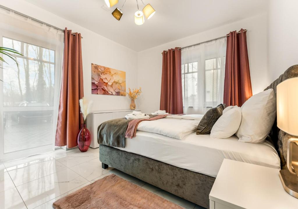 Llit o llits en una habitació de LoC-Luxus Apartment nahe Oldenburg