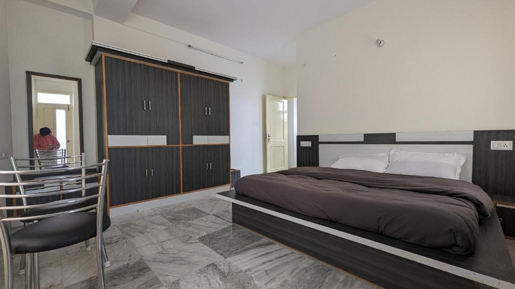 Postel nebo postele na pokoji v ubytování El Cielo, B&B