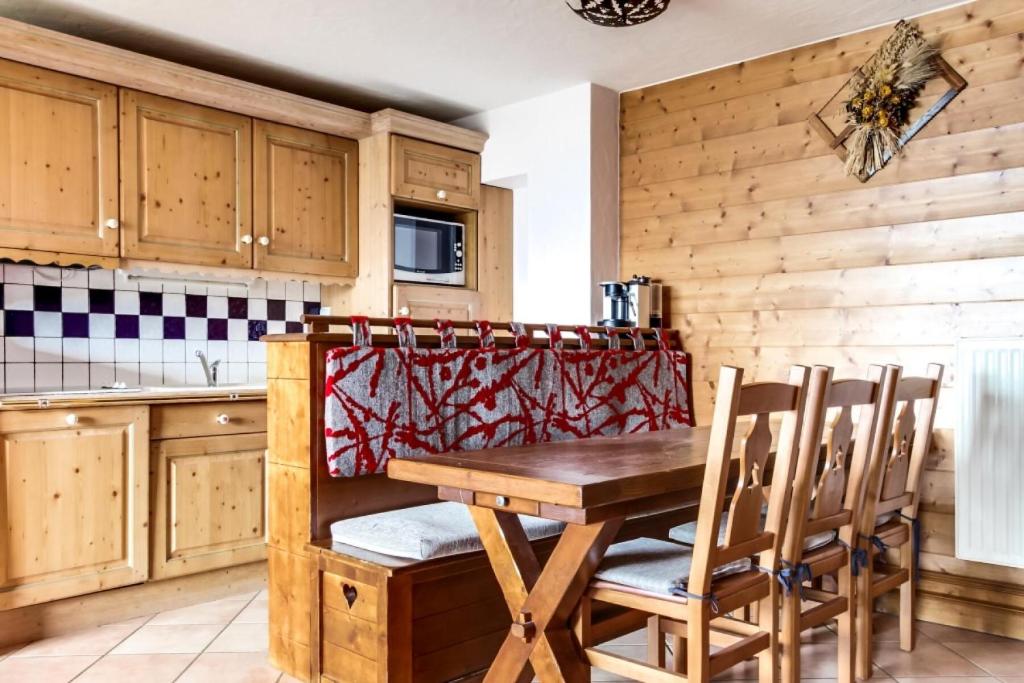 Kuchyňa alebo kuchynka v ubytovaní Résidence Les Alpages de Chantel - maeva Home - Appartement 4 pièces 8 personnes Sélection MAE-3804