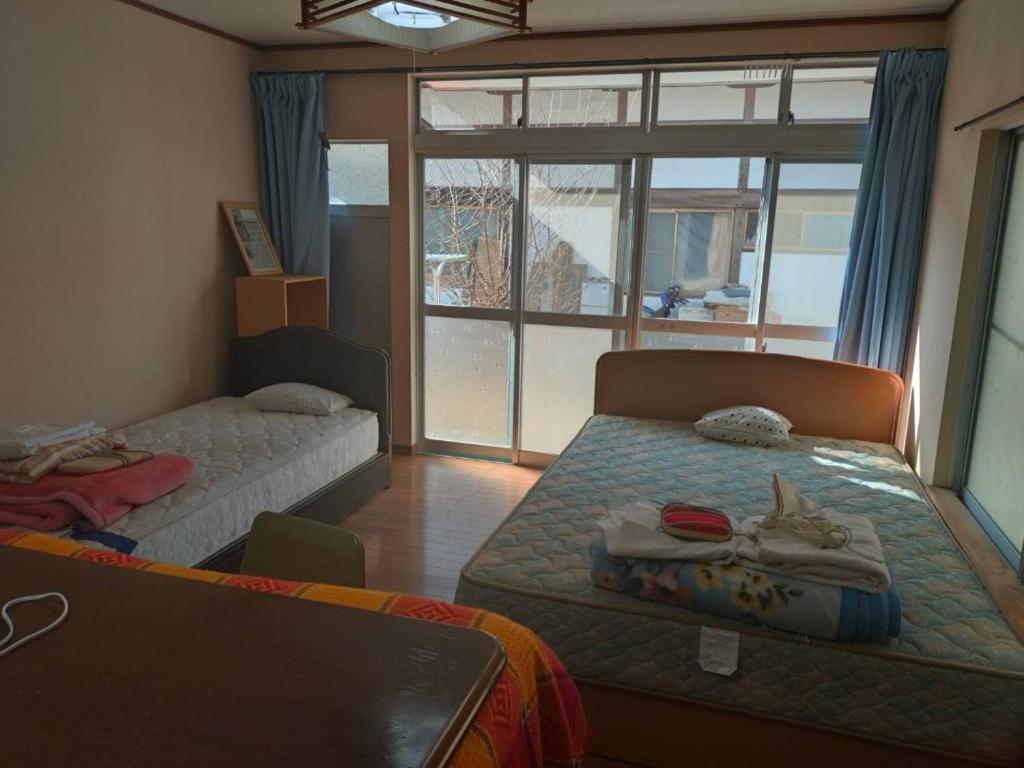 Giường trong phòng chung tại Iwaki - House - Vacation STAY 16504