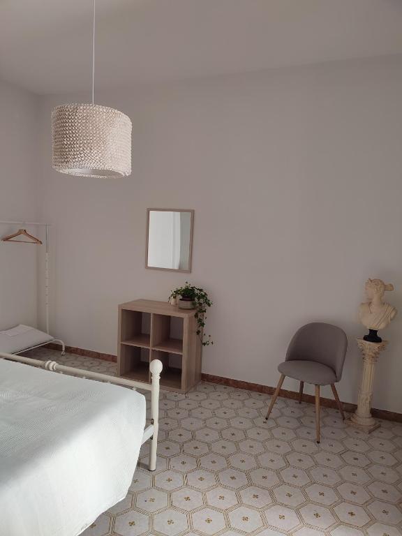 Postel nebo postele na pokoji v ubytování TERRA DI SUD Matera