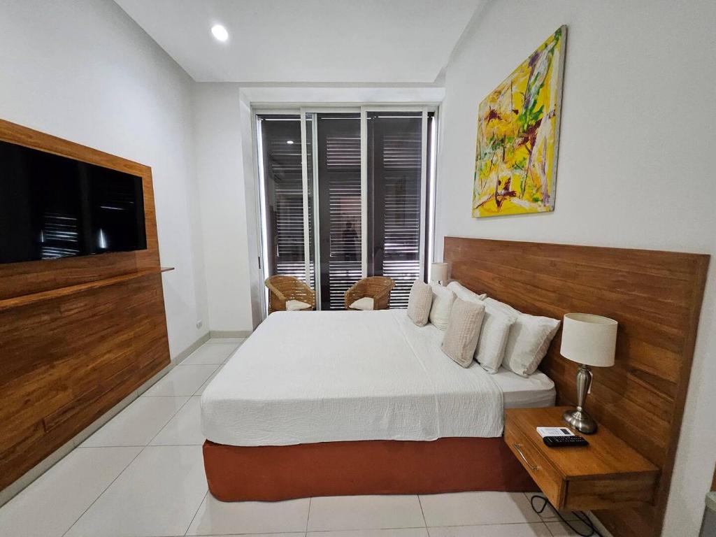 Postel nebo postele na pokoji v ubytování Casa Las Peñas Siglo XXI B&B