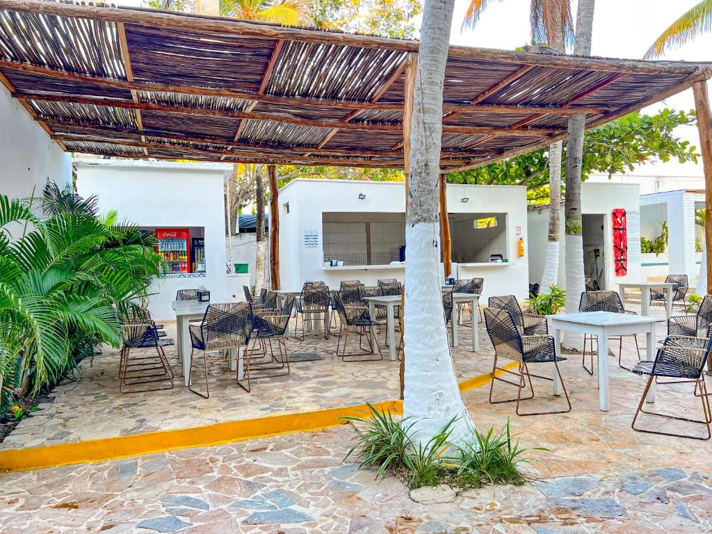 Restoran või mõni muu söögikoht majutusasutuses Hotel Palma Grande by Stanza