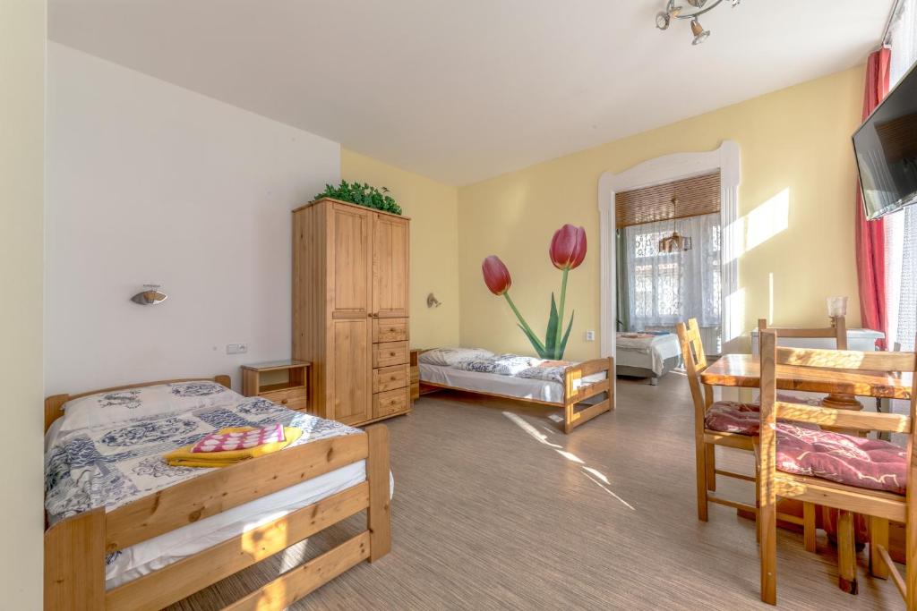 Postel nebo postele na pokoji v ubytování Penzion Pokorny